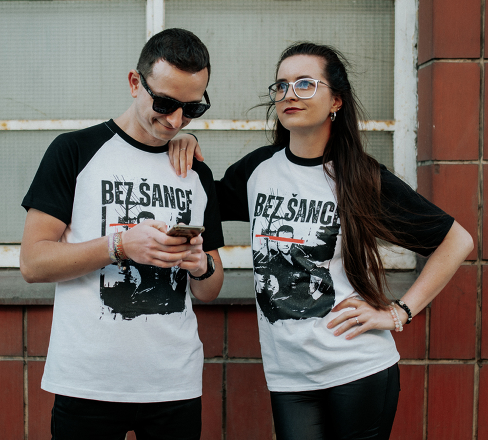 Fans wearing BEZ ŠANCE merchandise t-shirts