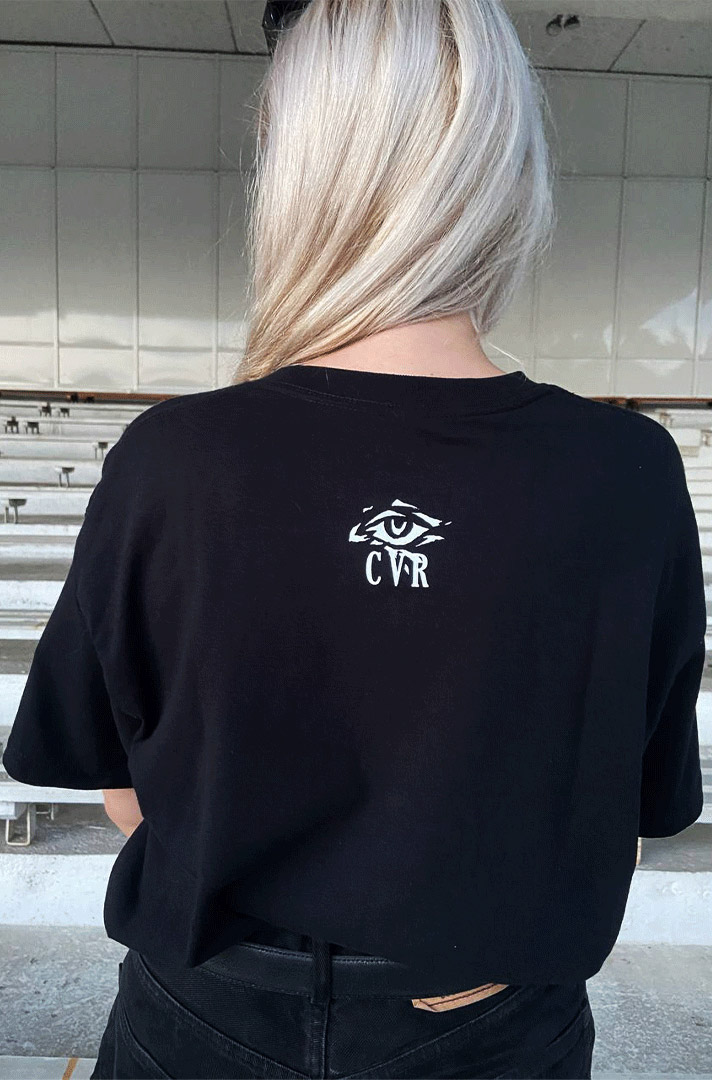 Model wearing Cold Venus Revisited black t-shirt — back